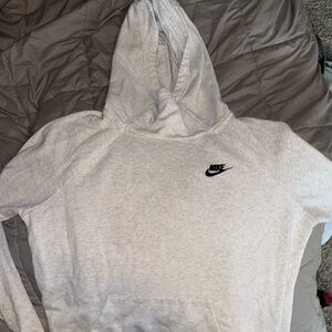 white nike hoodie with a turtleneck hood